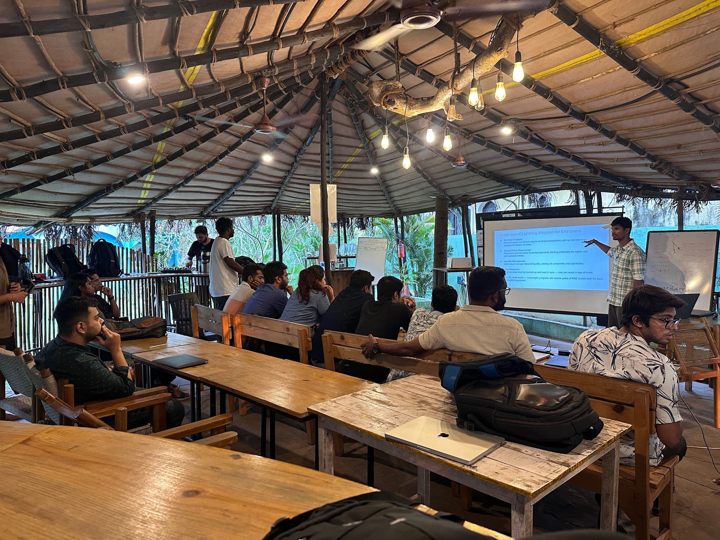 Rajarshi Maitra teaching a Lightning workshop to Bitshala students in an open-air pavilion